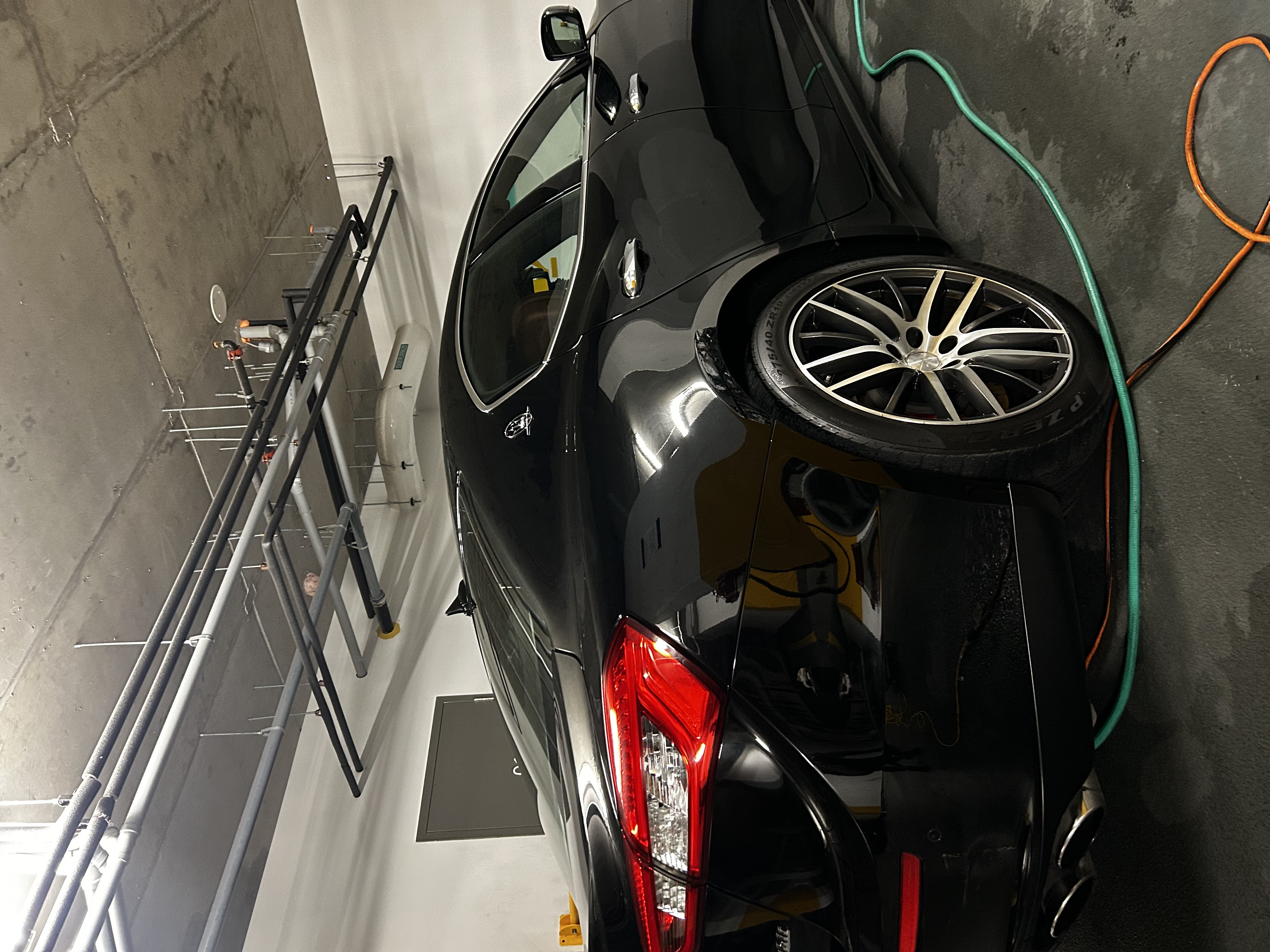 Maserati detailing in underground garage
